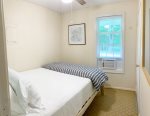 Second bedroom with a queen bed